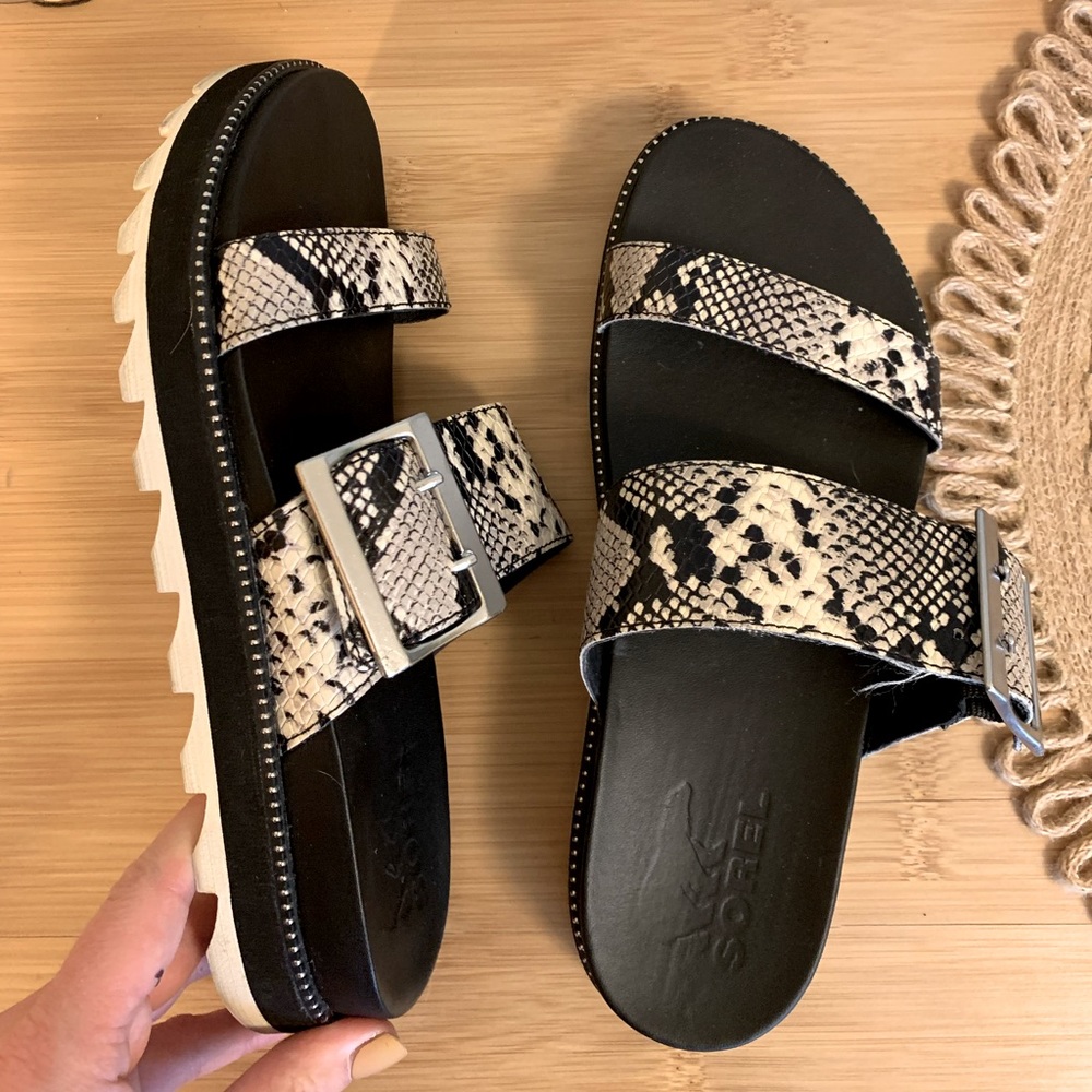 Sorel Sandal Size 7.5, reptile print with silver buckles.